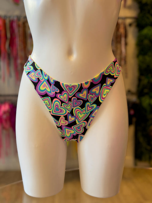 TANGA ASA DELTA CORAZONES NEÓN