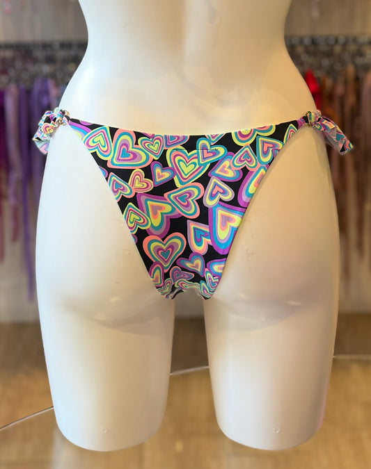 TANGA FLECOS CORAZONES NEÓN