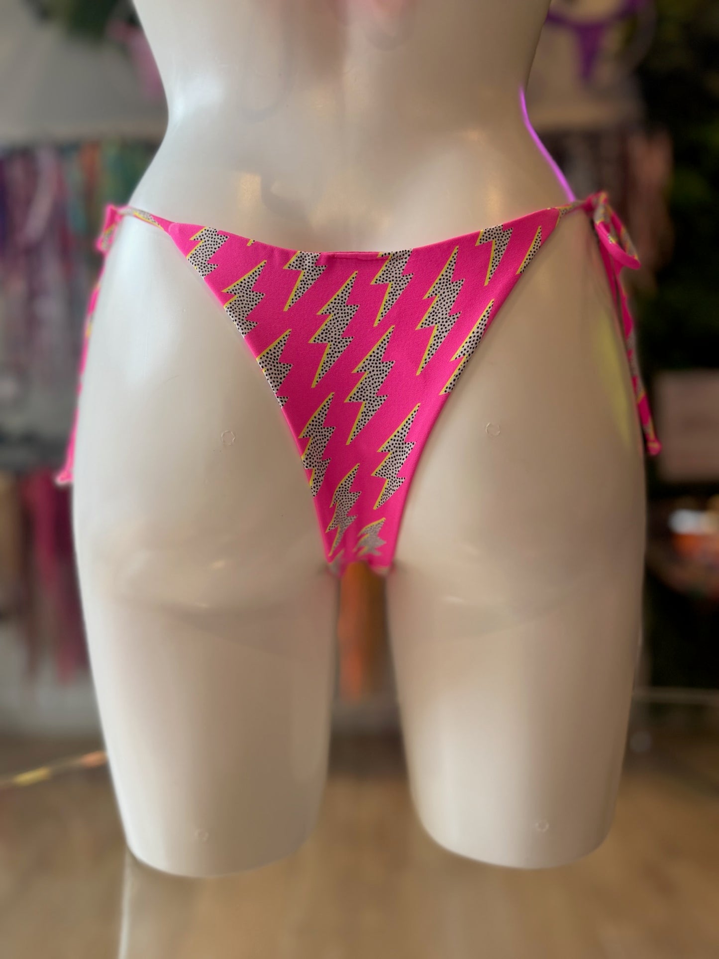 TANGA LAZOS RAYO ROSA NEÓN