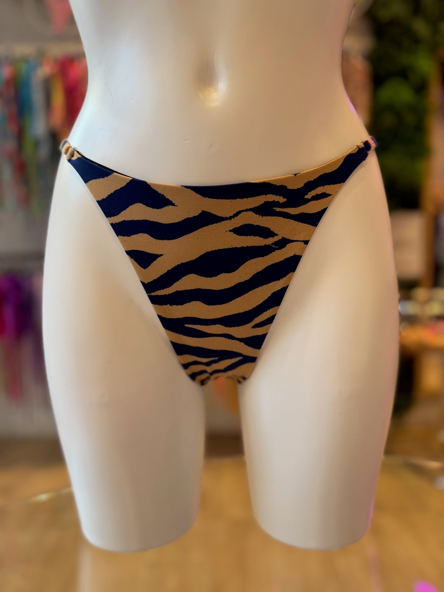 TANGA REGULABLE ZEBRA ORO-MARINO