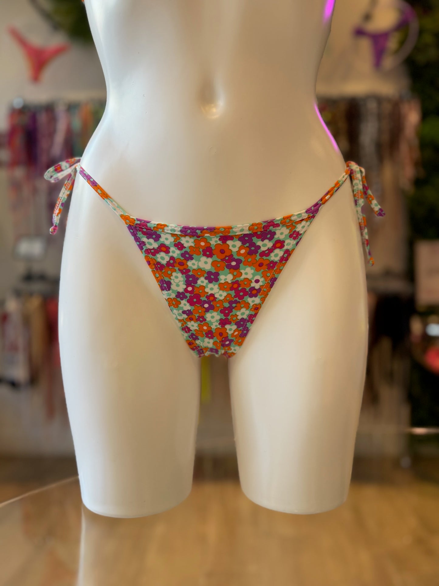TANGA RIPPLE FLORAL NARANJA-LILA